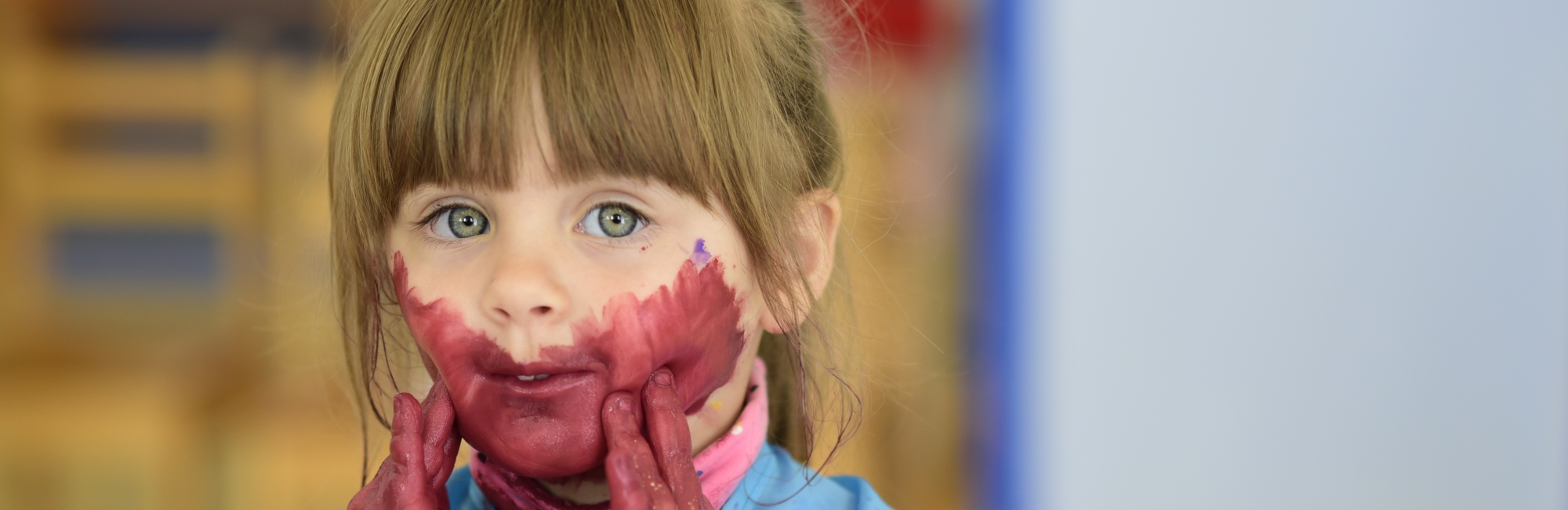 Child attending one of the FES childcare centres during an activity