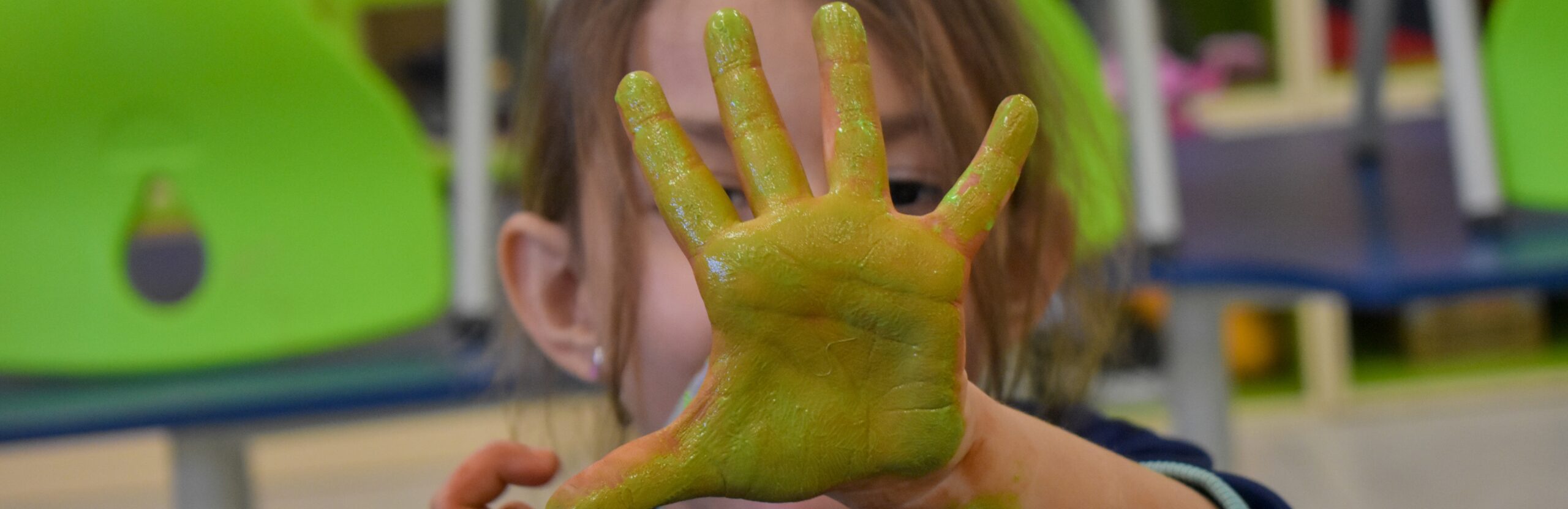 Child attending one of the FES childcare centres during an activity