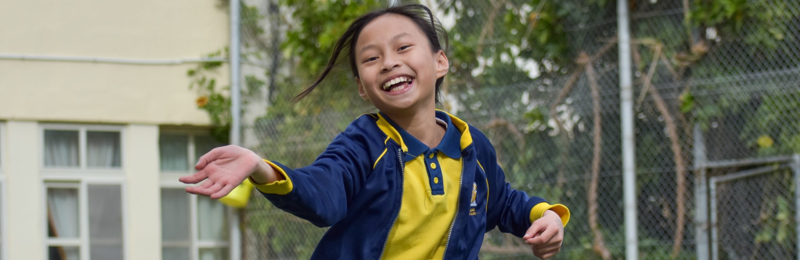 Child attending one of the FES childcare centres during an activity