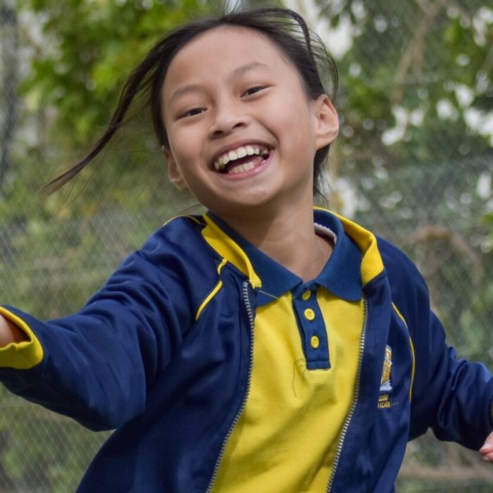Child attending one of the FES childcare centres during an activity