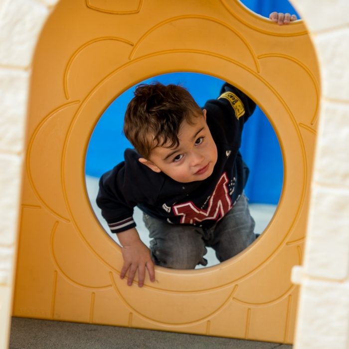 Child in Childcare outdoor area